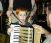 liam playing the accordian.jpg (63697 bytes)